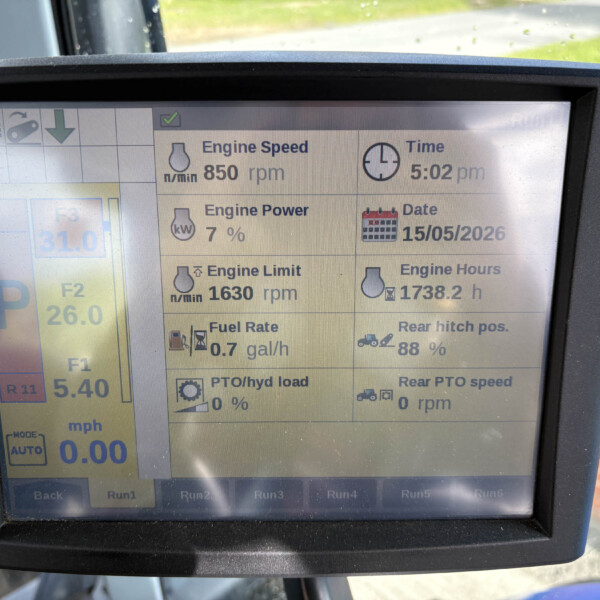 Tractor diagnostic display showing Engine Speed 850 rpm, Time 5:02 pm, Date 15/05/2026, Engine Power 7%.