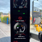 Digital vehicle instrument cluster showing current speed 0 km/h and RPM 0, with battery 13.2V and 75% charge, and a countdown/usage timer beneath.