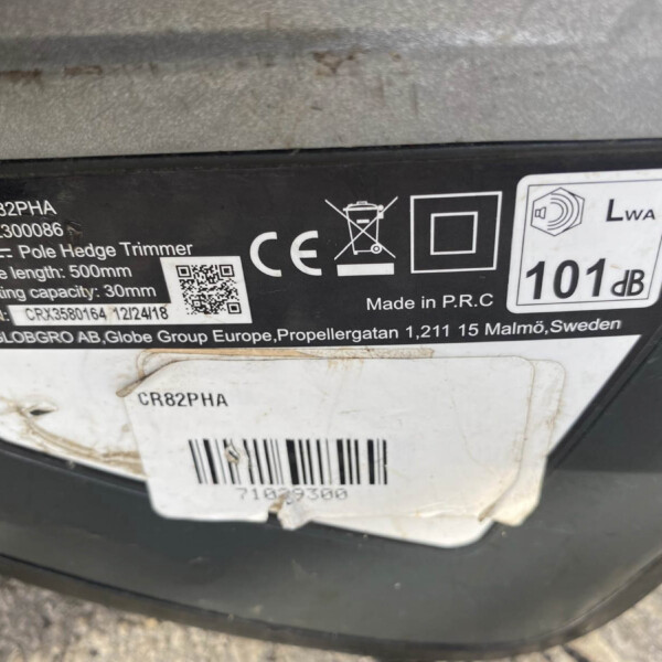 Label on a 82V pole hedge trimmer showing model 82PHA, ERP 2300086, blade length 500 mm and cutting capacity 30 mm (made in PRC).