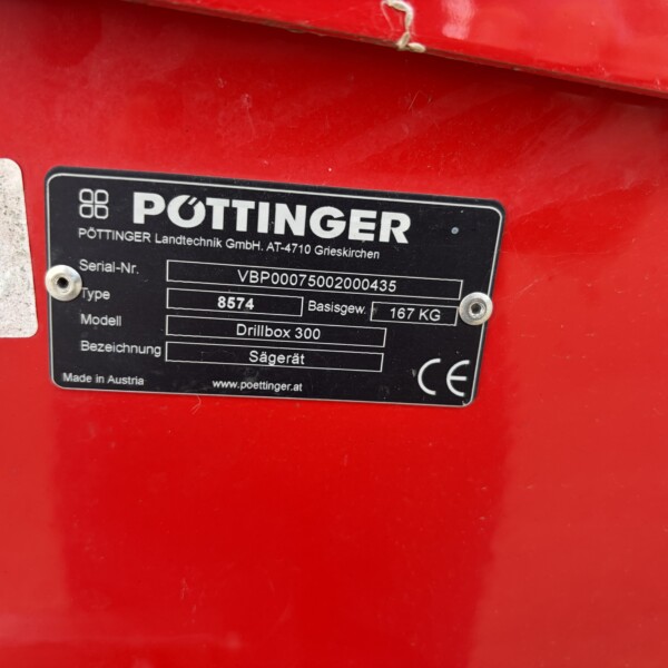 Red machinery panel featuring a black manufacturer plate with the word 'PÖTTINGER' and serial/model information visible