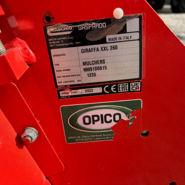 Identification plate on red machinery: GIRAFFA XXL 260, Mulchers, serial NM91D0615, Made in Italy.