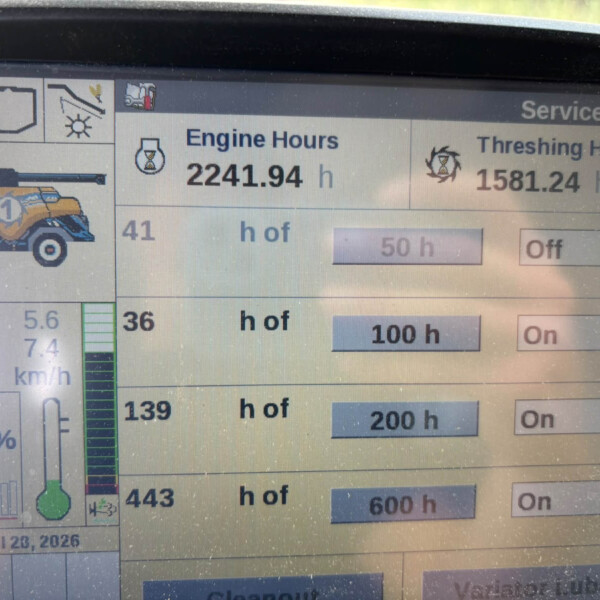 Display panel showing machine hours: Engine Hours 2241.94 h and Threshing Hours 1581.24 h with a tractor illustration on the left.