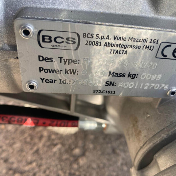 Metal nameplate on a machine with BCS Group logo, CE mark, and model/serial info partially visible.
